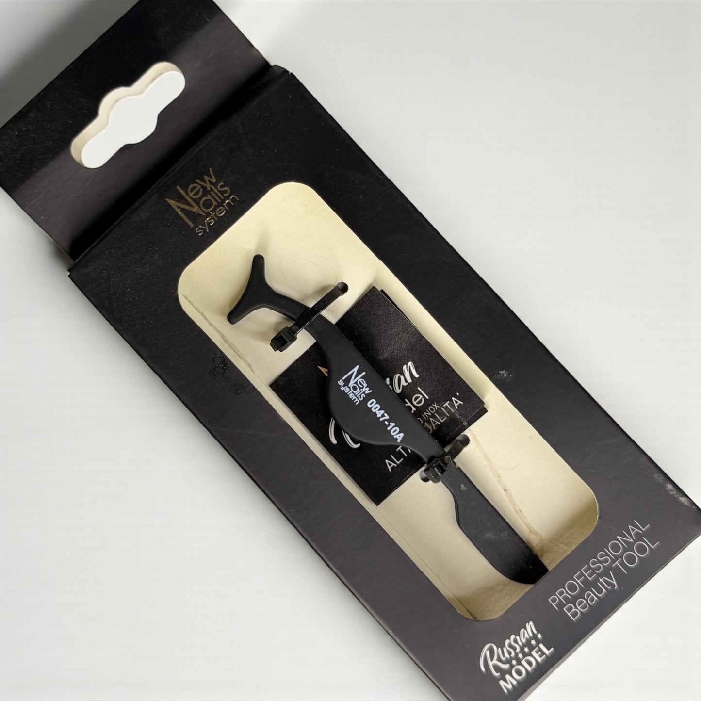 Pinzetta per ciglia finte